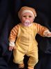 BébiNett - Ruurlo baba rugdalózó sapkával, raglán ujjú napsárga